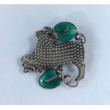 Georg Jensen, a silver brooch designed by Arno Malinowski, a lamb with beaded body set between two