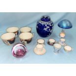 A selection of various miniature tea cups and saucers etc