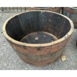 A half oak whiskey barrel diameter 61cm