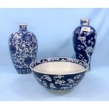 A Chinese blue and white baluster vase, decorated with prunus blossom, with 6 character mark to