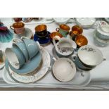 A Royal Doulton "Rose Elegans" part tea set, 18 pieces; a Wade harlequin 6 piece part coffee set;