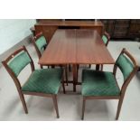 A 1950's/60's G-Plan sapele dining suite comprising rectangular side extending table, length 138 cm,