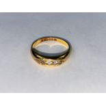 A Victorian chanel set 5 stone diamond ring, comprising of 5 old cut diamonds, 18ct hallmark