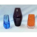 A purple Whitefriars glass vase with paper label and an orange coffin vase (slight chip to rim)