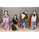 Four 20th century Chinese porcelain figures in traditional dress, 3 male, 1 female, Largest figure