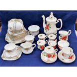 A Royal Albert "Poinsettia" 15 piece part tea set; a 1930's part tea set