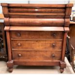 A Victorian mahogany large 'Scotch' chest of drawers with pulvinated frieze drawer, hat drawer,