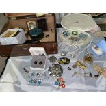 A selection of vintage costume jewellery in a jewellery box