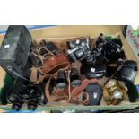 A selection of vintage cameras; binoculars; etc.