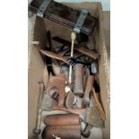 A selection of 19th century and later boxwood hat making tools; brushes tie press etc