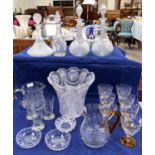 A large selection of cut glass including impressive large cut glass vase, decanters etc