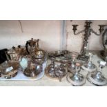 Two 4 piece silver plated tea sets; 4 silver plated dwarf candlesticks; other silver plate