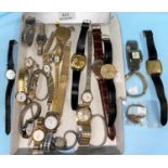 A large selection of ladies and gent's wristwatches including a ladies 18ct gold cased watch