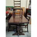 A Jacobean style oak dining suite comprising rectangular table and 4 ladder back chairs