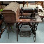 A Singer cast iron framed treadle sewing machine