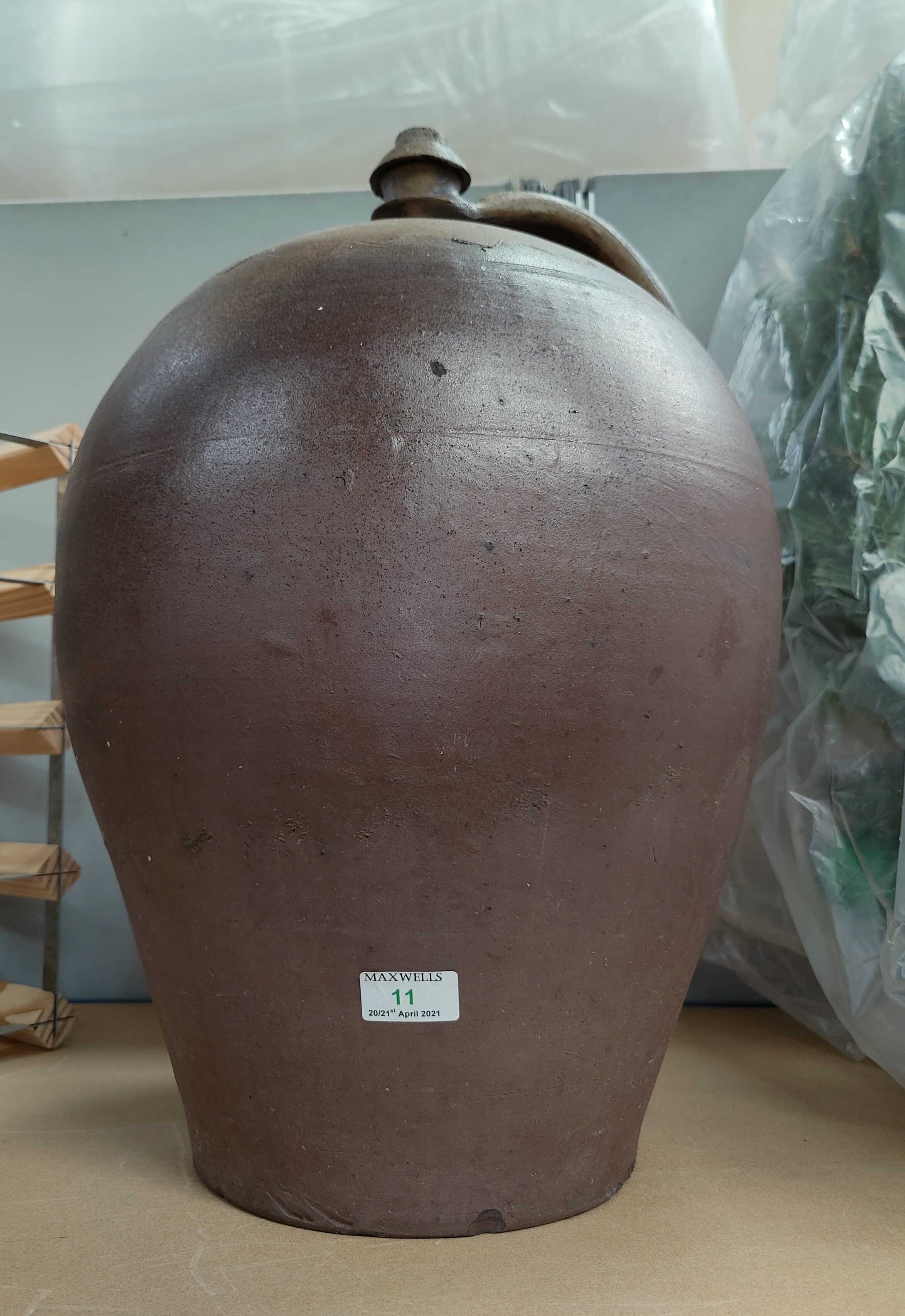 A large stoneware wine flagon ht