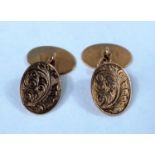 A pair of 9ct gold oval cufflinks with naturalistic designs, makers mark JC 4.5gms