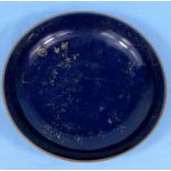 A Chinese porcelain dish with deep blue glaze with faded gilt decoration diameter 20cm