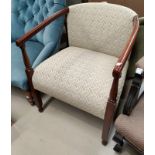 A 1930's tub chair reupholstered in fawn fabric; a 1930's cane back armchair; a mahogany cane seat