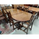 An "Old Charm" period style oak dining suite comprising oval extending dining table with 6 (4+2)