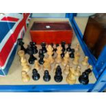 A turned wood chess set; a set of ebony and bone dominoes, up to double 9's; other vintage games