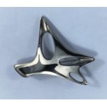 Georg Jensen, a silver brooch designed by Henning Koppel of modernist pierced abstract form and