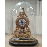 A 19th century French mantel clock in porcelain and gilt metal rococo style case, with drum movement