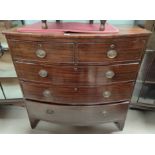 A 19th century mahogany bow front chest of 3 long and 2 short drawer with brass drop handles, on