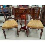 An Edwardian pair of carved mahogany dining chairs, a reproduction shaving stand