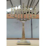 A large brass 9 branch menorah/hanukkah.