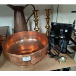 An Arts & Crafts beaten copper bowl (dented)