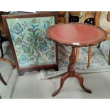 A reproduction wine table; a needlework firescreen; a stool
