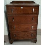 A 1930's oak 4 height chest of drawers