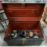 A japanned tin trunk and a selection of metal ware