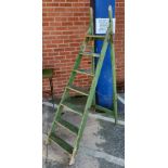 A vintage A-frame decorators ladder in green finish (decorative purposes only)