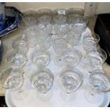 A part suite of 24 cut glass drinking glasses including 6 sherry, 8 port and 8 wine