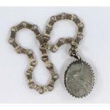A Victorian oval white metal locket on collarette chain tested silver, locket hallmarked