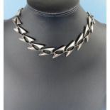 Georg Jensen, a silver necklace designed by Henning Koppel formed from double fin shaped pierced