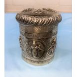 A 19th century Indian silver cylindrical tea caddy with compressed cover, engraved and repousse