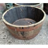 A half oak whiskey barrel diameter 61cm