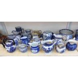 A selection of blue and white china, jugs, tea pots etc