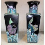 A pair of Chinese famille verte vases with squared bodies, various mythical sea creatures to the