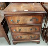 A dwarf inlaid mahogany 3 height chest of drawers in the Georgian style, width 49 cm