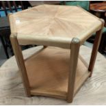 A mid 20th century Danish teak hexagonal two height occasional table, stamped made in Denmark to