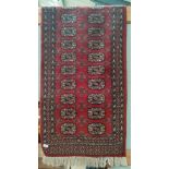 A Bokhara type rug with rust ground; 2 kelim rugs