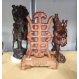 A Chinese carved hardwood character on stand, height 40cm. 2 carved Chinese wooden figures, one