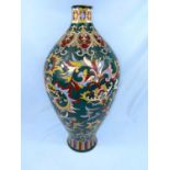 A grimwear lustre vase and a colourful Chinese stoneware vase (heavily restored)