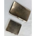 Two hallmarked silver engine turned cigarette cases, Birmingham 1937 & 1943, 8.5 oz