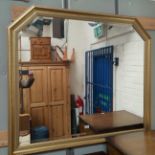 A large overmantel mirror in gilt frame