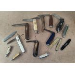 A selection of vintage pocket knives of various types